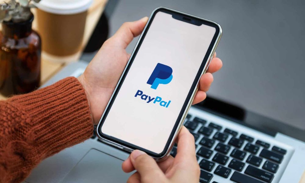 como comprar acciones de PayPal